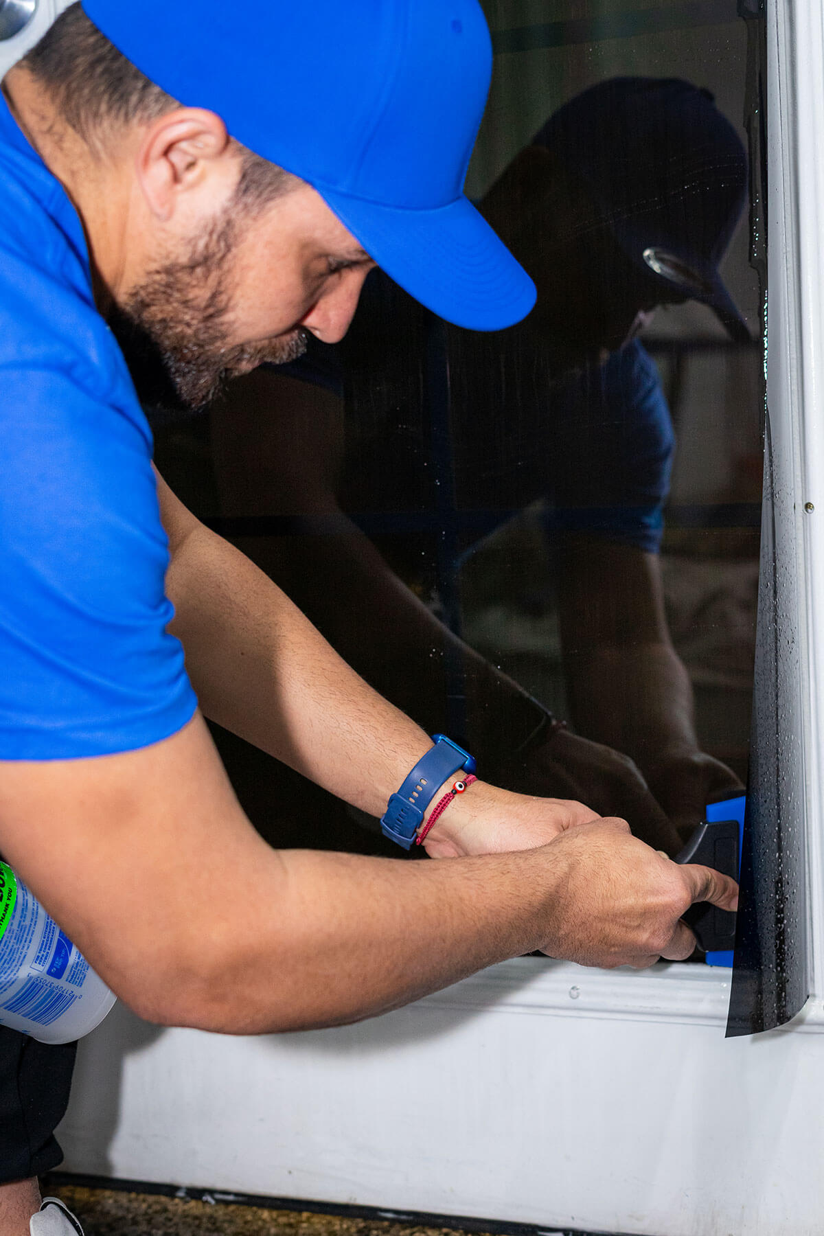 Sacrificial anti-graffiti window film on a Parker storefront, easy peel-and-replace after tagging or etching