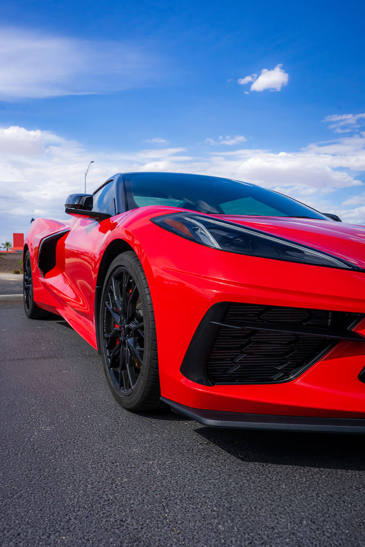 Track Package PPF on a Parker vehicle front bumper, hood leading edge, headlights, and mirrors
